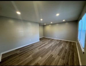 Renovated room with new flooring and lighting at 2155 N Catherwood