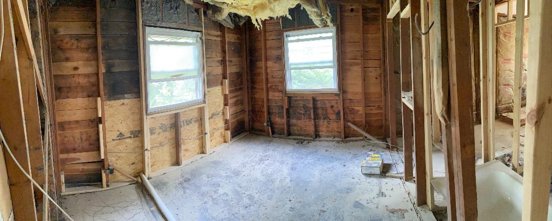 Bedroom framed out and gutted to the studs during renovation at 2155 N Catherwood